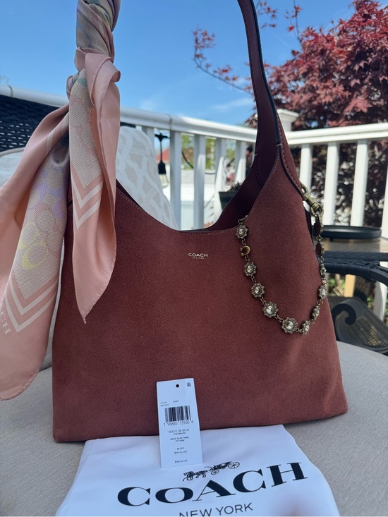 Coach Handbags - NWT with original packaging! 
Coach Brooklyn 34 in the hot new Clay Suede!